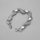 thumbnail image 4 of Pulsera de serpiente que brilla en la oscuridad, luminosa, vintage, de acero inoxidable plateado., 4 of 5