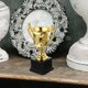 thumbnail image 1 of FENGGUIQU Trophy Plástico Dorado Para Eventos Deportivos Y Accesorios De, 1 of 8