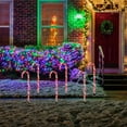 thumbnail image 3 of Northlight Lighted Candy Cane Outdoor Christmas Pathway Markers- Clear Lights - 28" White Wire - 3ct, 3 of 9