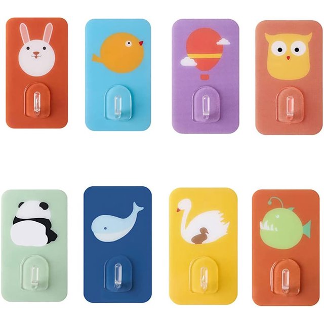 Ganchos adhesivos, paquete de 8. Gancho de pared decorativo e impermeable diseñado por Cartoon, ideal para niños y adolescentes. Perchas para oficina, hogar, dormitorio, baño o cocina TUNC Sencillez