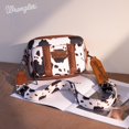 thumbnail image 2 of Bandolera Wrangler con estampado de vaca para mujer, color marrón Montana West, 2 of 6