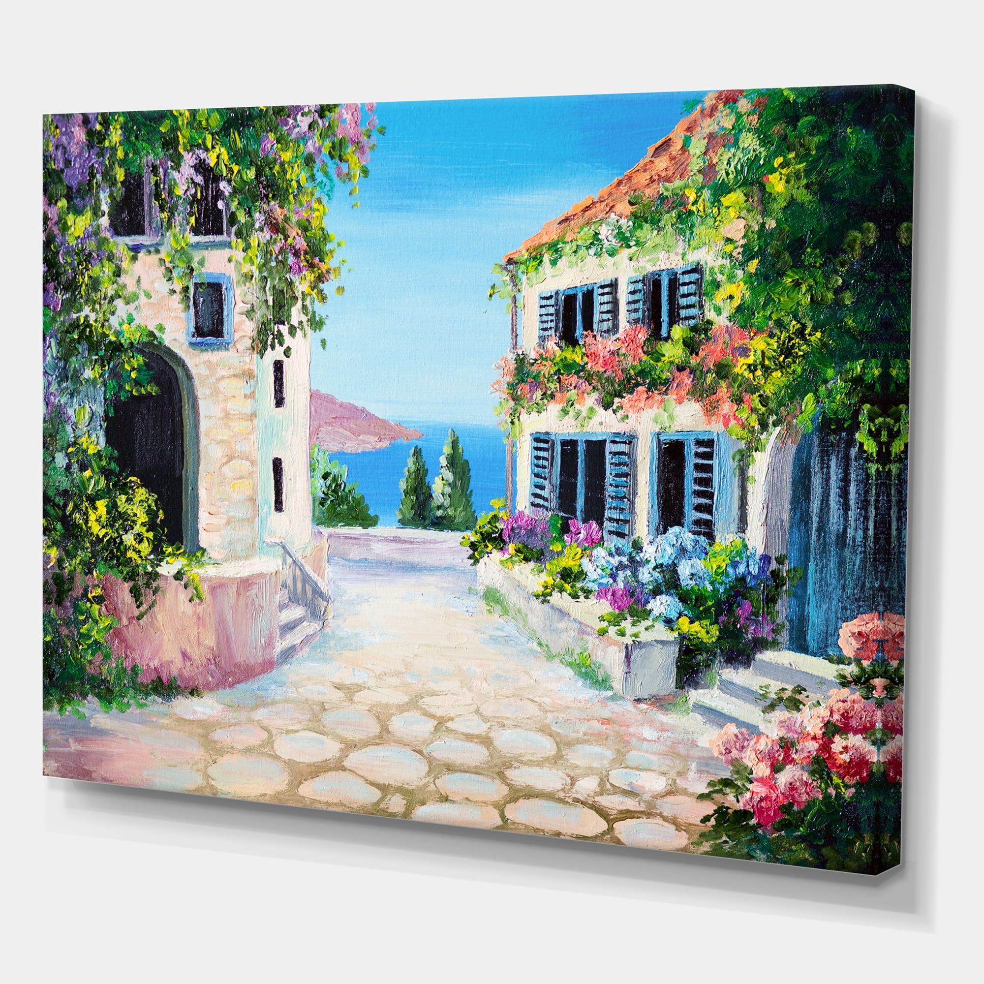 Designart ' Blossoming Flowers With White Houses With Near The Sea ' Nautical & Coastal Canvas Wall Art Print
