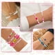thumbnail image 2 of Pulseras TUNC coloridas oro blanco Sonrisa Corazón Estrella mal de ojo, 2 of 5