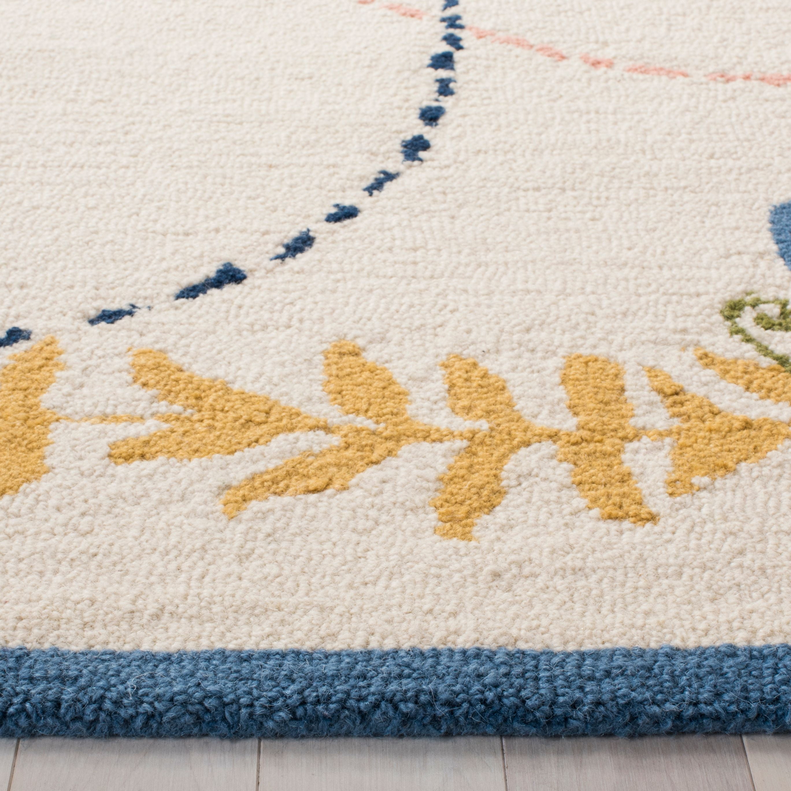 SAFAVIEH Kids Collection SFK390A Handmade Ivory/Blue Rug