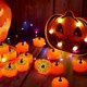 thumbnail image 3 of - Paquete de 12 luces de té de calabaza parpadeantes con calabazas LED parpadeantes para fiestas de Halloween (tela de araña), 3 of 5