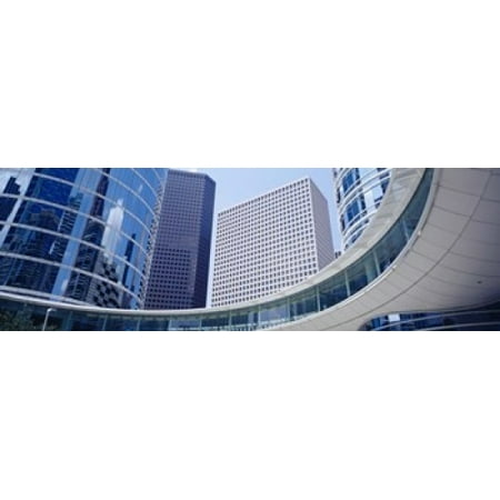 Low angle view of buildings in a city Enron Center Houston Texas USA Poster