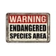thumbnail image 1 of Señal de metal de estilo vintage que advierte sobre la presencia de especies en peligro de extinción. Tamaño: 16 x 12 pulgadas, 1 of 4