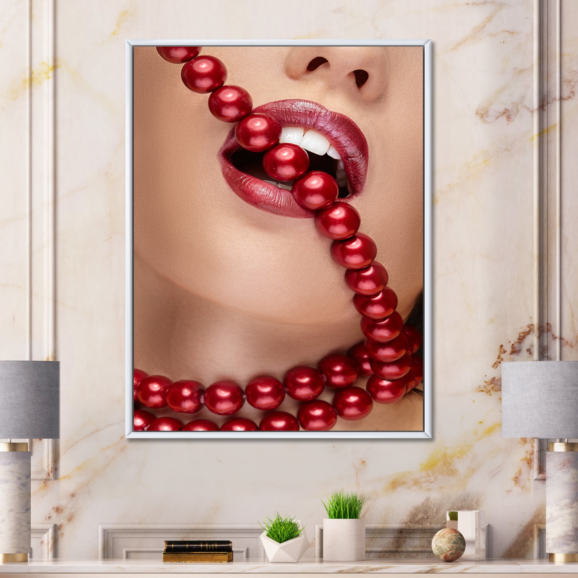 Girl Mouth With Red Lipstick Biting Red Pearls 30 in x 40 in Framed Photography Canvas Art Print, by Designart