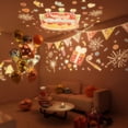thumbnail image 4 of Lampe LED Rotation 360° 8 Chansons 6 Films de Projection 4 Couleurs Cadeau de Mode Noël Anniversaire Veilleuse pour Enfants Projecteur d'Étoiles, Veilleuse Rechargeable Musicale et Lumineuse pour Bébé, 4 of 5