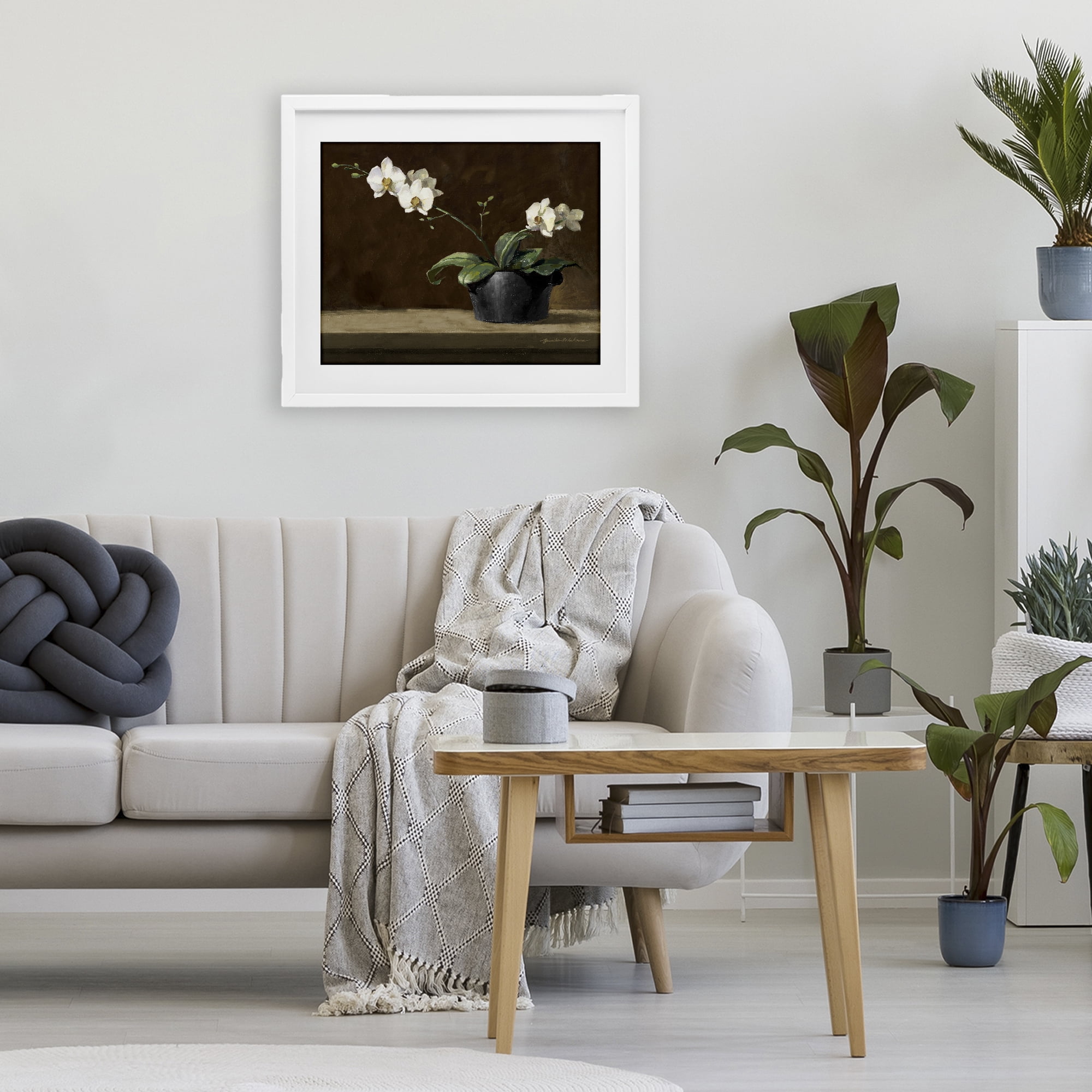 Stupell Industries Potted White Orchid on Ledge White Framed Print Under Glass, design by Yumiko Ichikawa