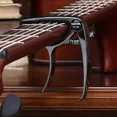 thumbnail image 1 of Metal Guitar Capo Aluminum Alloy Guitar Tuner Clamp Professional Key Trigger Capo for Acoustic Electric Musical Instruments black, 1 of 6