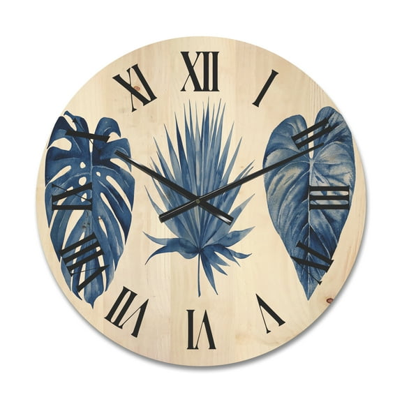 Designart 'Tropical Leaves In Classic Blue ' Tropical Wood Wall Clock