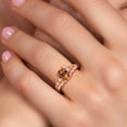 thumbnail image 4 of Gem Stone King 18K Rose Gold Plated Silver Ecstasy Mystic Topaz and White Moissanite 3 Stone Engagement Ring for Women | 1.58 Cttw | Oval 8X6MM | Round 2MM | Gemstone November Birthstone | Size 7, 4 of 6