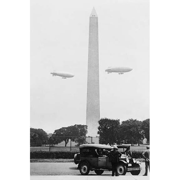 Blimps practice over the Washington Monument- Fine Art Canvas Print (20" x 30")