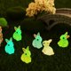 thumbnail image 2 of 100 Uds Mini figuritas de conejos que brillan en la oscuridad figuritas de animales pequeñas decoraciones de conejitos figuritas de conejo de escritorio miniaturas de resina, 2 of 7