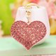 thumbnail image 4 of Llavero de Corazón y Melocotón para San Valentín | Llavero de Aleación con Forma de Corazón para Mochila, Bolso y Móvil | Regalo Romántico para Parejas | 9,5 X 4 Cm | Rosa, Rojo, Blanco, Dorado, 4 of 6