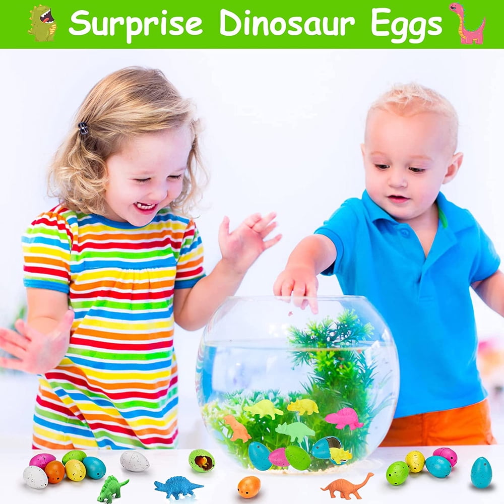Children enjoying water hatching dinosaur eggs