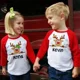 thumbnail image 1 of Camiseta navideña personalizada con ciervo para niños, ropa raglán con nombre personalizado para niños, camisetas a juego para fiestas entre hermanos, camisetas para niños, 1 of 5