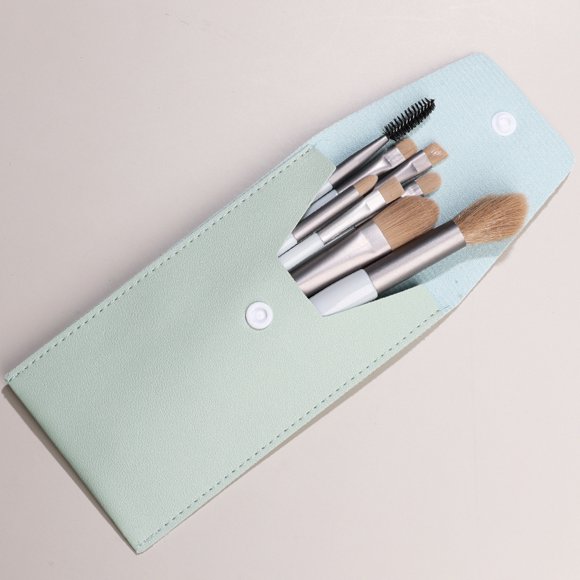 Nvzi Juego de 8 brochas de maquillaje para base, polvos, correctores, sombras de ojos, rubor, brochas de maquillaje de color azul claro con bolsa de almacenamiento de color azul claro