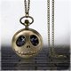 thumbnail image 3 of Reloj de bolsillo retro para hombres y mujeres con caja de calavera y collar con esfera de bronce antiguo, 3 of 5