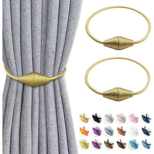 ZYNERY 2 Pcs Magnetic Curtain TieBacks in gold, featuring durable polyester-silk rope and nickel-plated magnets. The tiebacks are shown securing a grey curtain, with their sleek design and adjustable 46 cm length suitable for light or heavy drapes. Includes a variety of color options displayed below.
