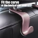 thumbnail image 1 of Gancho para reposacabezas de asiento de coche, ganchos para asiento de coche, organizador de almacenamiento, accesorios interiores para bolsos, abrigos, paraguas, bolsas de comestibles, bolso, 1 of 5