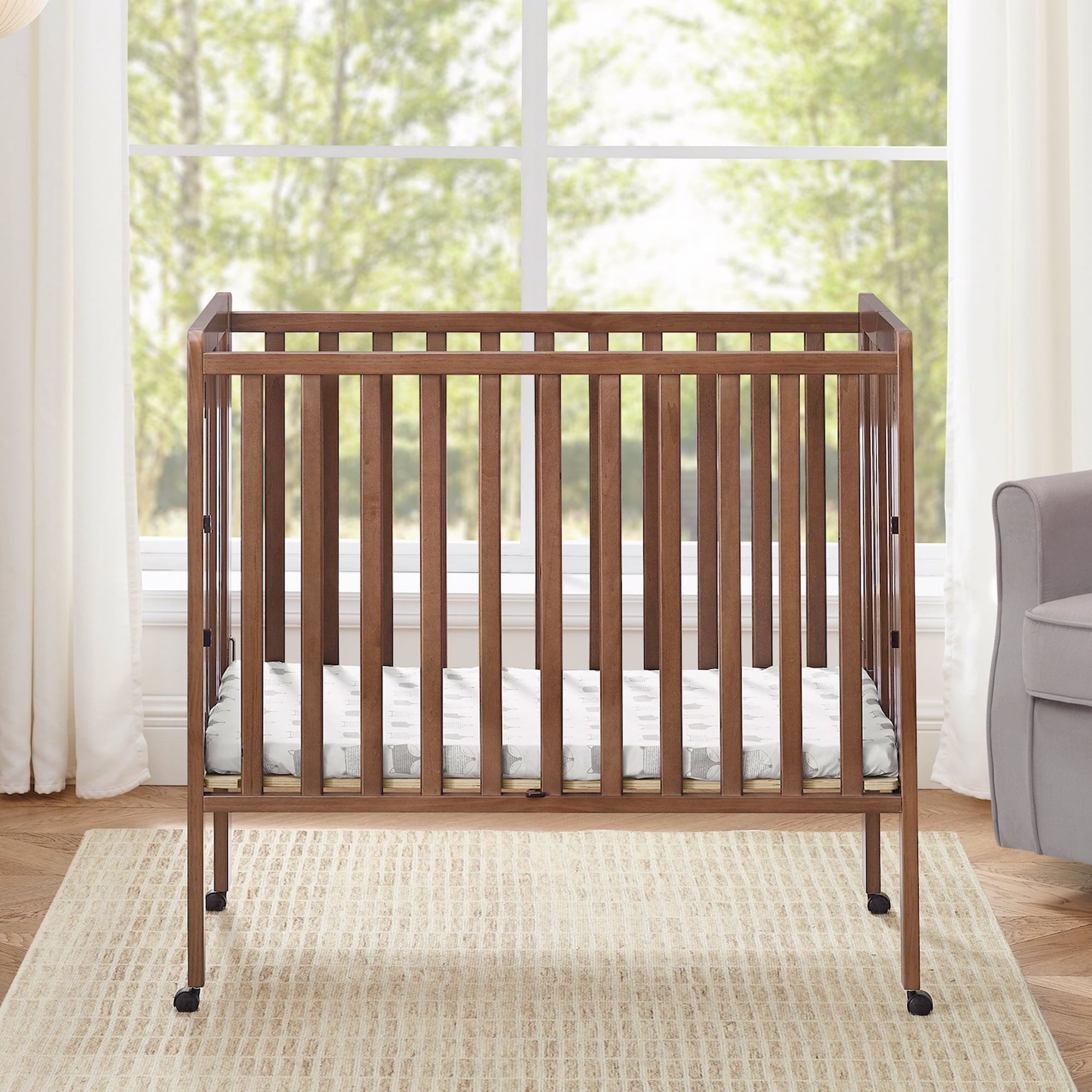 Delta Children Lee Portable Folding Mini Crib with 1.5-Inch Mattress - Greenguard Gold Certified, Chestnut