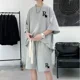 thumbnail image 4 of Conjunto de 2 piezas de chándal sencillo con diseño de gofre para hombre y mujer, camiseta y pantalones cortos de diseño urbano holgados de verano, ropa deportiva informal con diseño de parche, 4 of 5