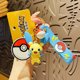 thumbnail image 1 of Llavero de coche con forma de Pokémon Gengar Jigglypuff auténtico, colgante de Pikachu con dibujos animados, colgante de mochila escolar para pareja, 1 of 2