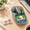 Green, variant on Blue Tri-Mode Wireless Computer Mouse with Swappable Figurines and Clear Magnetic Top