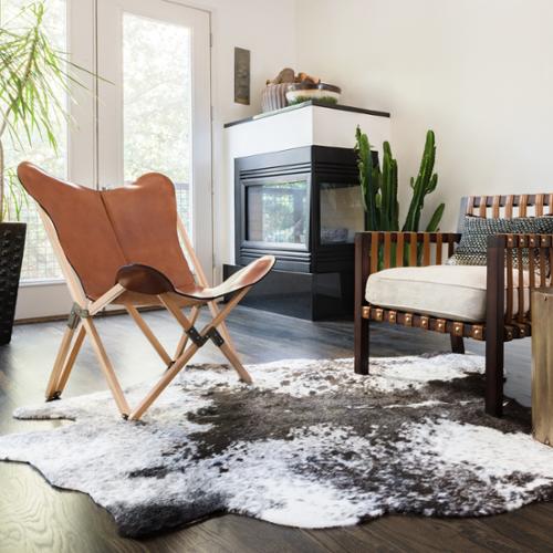Alexander Home Faux Cowhide Area Rug