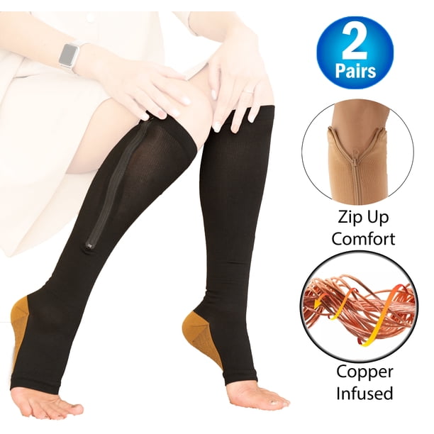 2 medias de compresión con cremallera de cobre y punta abierta hasta la rodilla. Suaves y transpirables, ofrecen soporte, reducen la hinchazón y mejoran la circulación. Talla extra grande, color