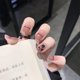 thumbnail image 1 of SINHOT Uñas postizas cortas ovaladas con línea negra y rosa, uñas acrílicas redondas francesas, uñas postizas de completa para mujeres y niñas, 24 unidades, 1 of 5