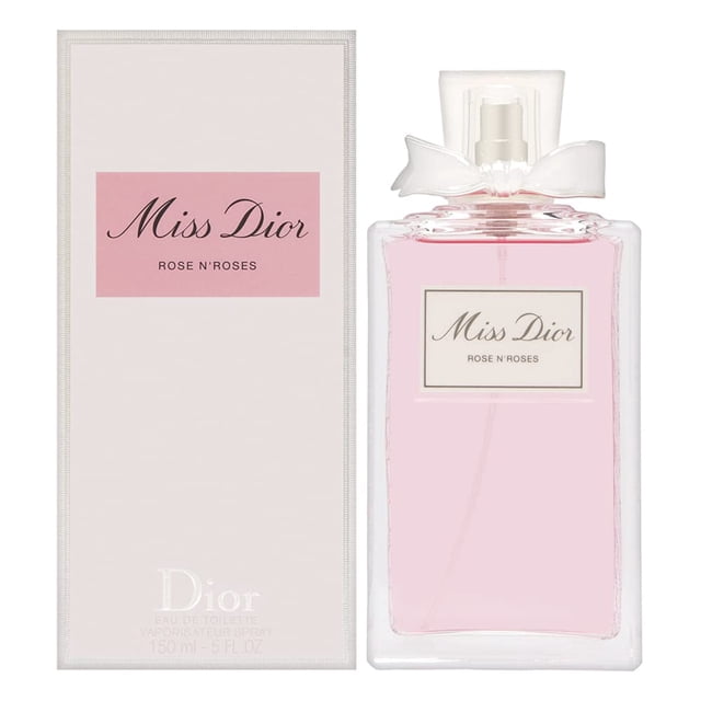 perfume miss dior rose n' roses edt de christian dior, 150 ml — botella rectangular de vidrio transparente con líquido rosa pálido y etiqueta frontal blanca "Miss Dior", capuchón translúcido con lazo blanco; caja blanca con panel rosa, vista frontal; adecuado como fragancia femenina para uso diario y a menudo elegido como regalo elegante.