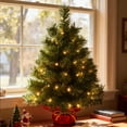 thumbnail image 2 of Bringstar 2ft Pre-Lit Artificial Mini Christmas Tree with 50 LED Lights, Tabletop Green Xmas Tree with Red Base for Holiday Home, Office, or Party Décor, 2 of 13