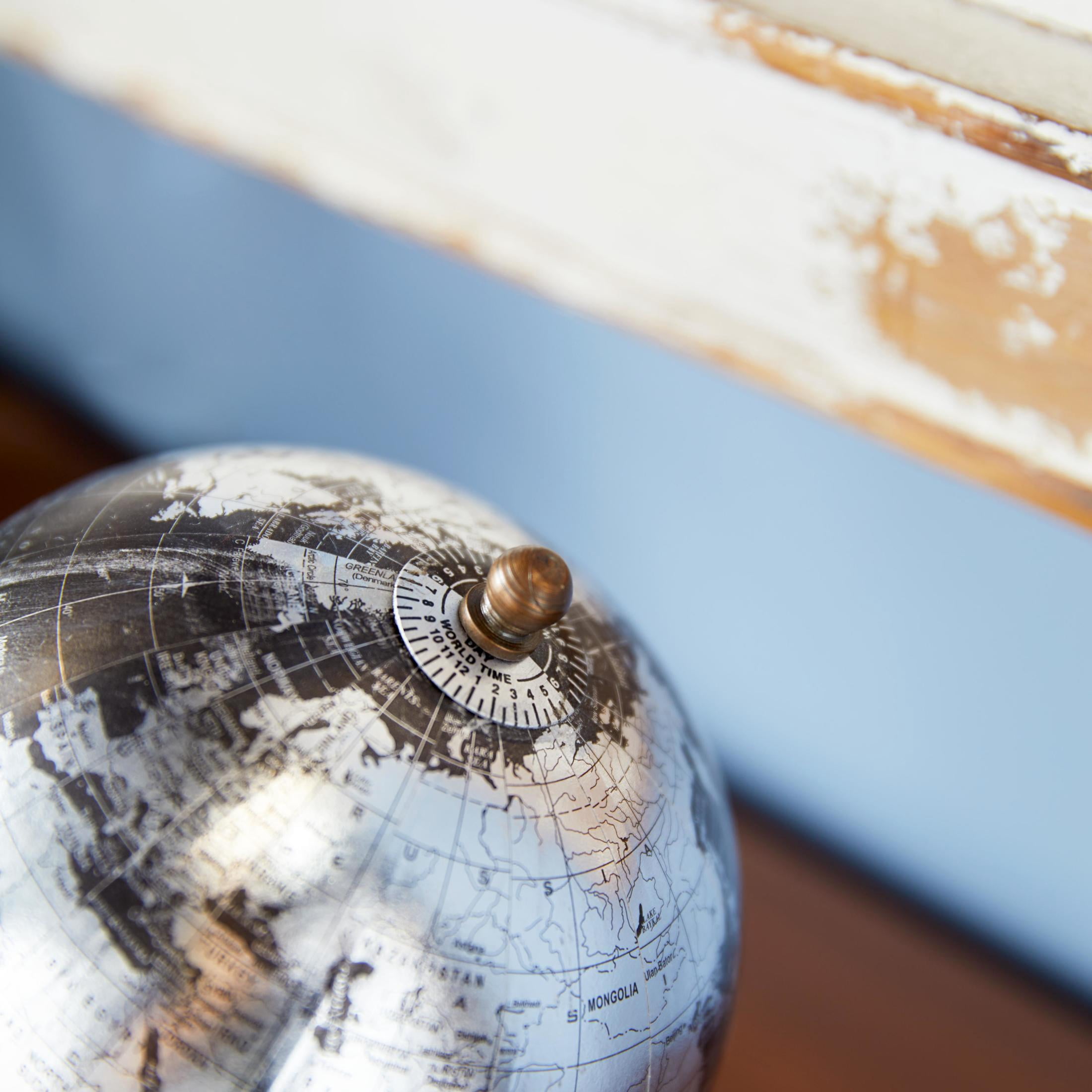 DecMode 5" Small Black World Map Globe with Silver Continents and White Marble Base