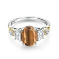 thumbnail image 2 of Gem Stone King 925 Silver and 10K Yellow Gold 3-Stone Ring Oval Brown Tiger Eye and Moissanite (2.00 Cttw, Size 7), 2 of 3