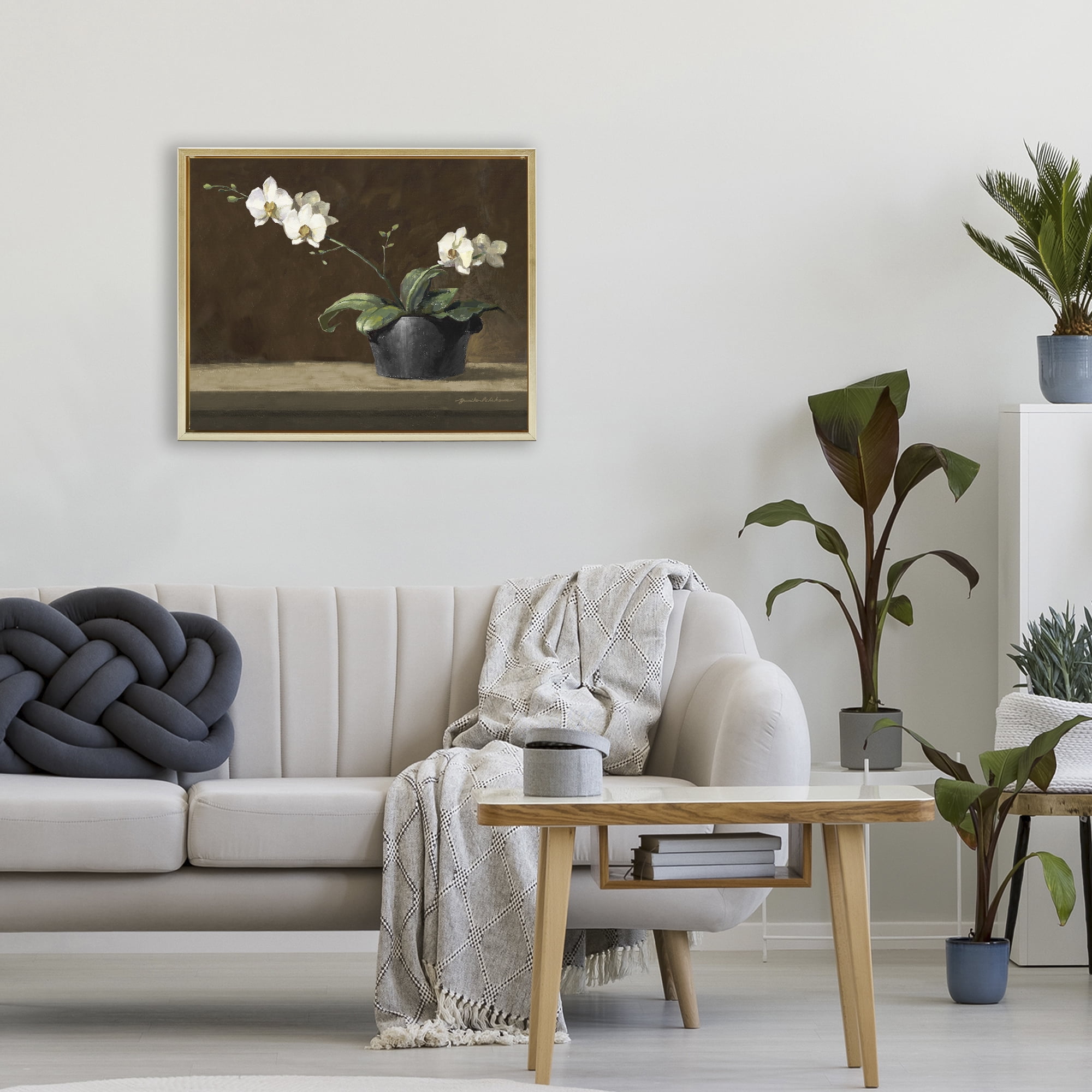 Stupell Industries Potted White Orchid on Ledge Gold Framed Floater Canvas Wall Art, design by Yumiko Ichikawa
