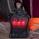 thumbnail image 3 of Lápida de cementerio con decoraciones de Halloween con calavera iluminada y voz espeluznante, 3 of 9