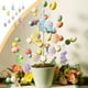 thumbnail image 1 of Set de 12 Huevos de Espuma de Colores y Adornos Colgantes de Pascua, Ideales para Fiestas Familiares y Decoración de Interiores., 1 of 6