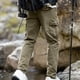 thumbnail image 4 of Pantalones largos de moda para hombre, casuales, de color sólido, con bolsillos y cremallera, cintura elástica, de poliéster., 4 of 7