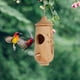 thumbnail image 1 of Muyoka Casa de colibrí de madera Nido de colibrí colgante con anillo de metal dorado Alimentadores de semillas de colibrí duraderos Muyoka Hogar, 1 of 6