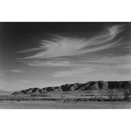 View of arid area surrounding the relocation center mountains in the background  Ansel Easton Adams was an American photographer best known for his black-and-white photographs of the American West 