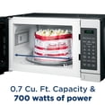 thumbnail image 3 of GE GCST07N1WBB Horno microondas, 700 vatios, 6 configuraciones de cocción automática, elementos esenciales de cocina para la encimera, dormitorio o apartamento, tecnología de bloqueo para niños 0.7 pi, 3 of 5