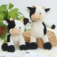 thumbnail image 2 of Peluche de vaca en blanco y negro con forma de flor sonriente, muñeco de ternero sentado, concha de cuero, regalo de cumpleaños, muñeca de trapo para niña, 2 of 6
