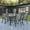 Gray, variant on Emma + Oliver Five Piece Patio Table Set with 31.5" x 55" Metal Table with Tempered Glass Top and 4 Brown Flex Comfort Stacking Chairs