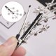 thumbnail image 3 of Horquillas para el pelo XCF con forma de estrella de cinco puntas y diamantes de imitación elegantes para novias y mujeres, 3 of 4