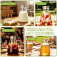 thumbnail image 6 of TINANA 68 oz Glass Pitcher with Lid, 2L Borosilicate Water Carafe, Stainless Steel Filter Lid, Iced Tea Lemonade Juice Beverage Jug, Yellow Handle, 6 of 6