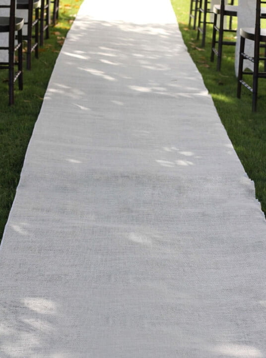 white burlap aisle runner