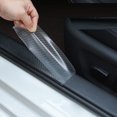 thumbnail image 2 of Tira adhesiva anticolisión para puerta de coche, película transparente invisible para carrocería, tira de umbral resistente a arañazos de fibra de carbono para maletero, 2 of 4